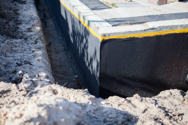 Professional Waterproofing technician working in Grady, AL